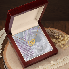 to child, interlocking hearts necklace